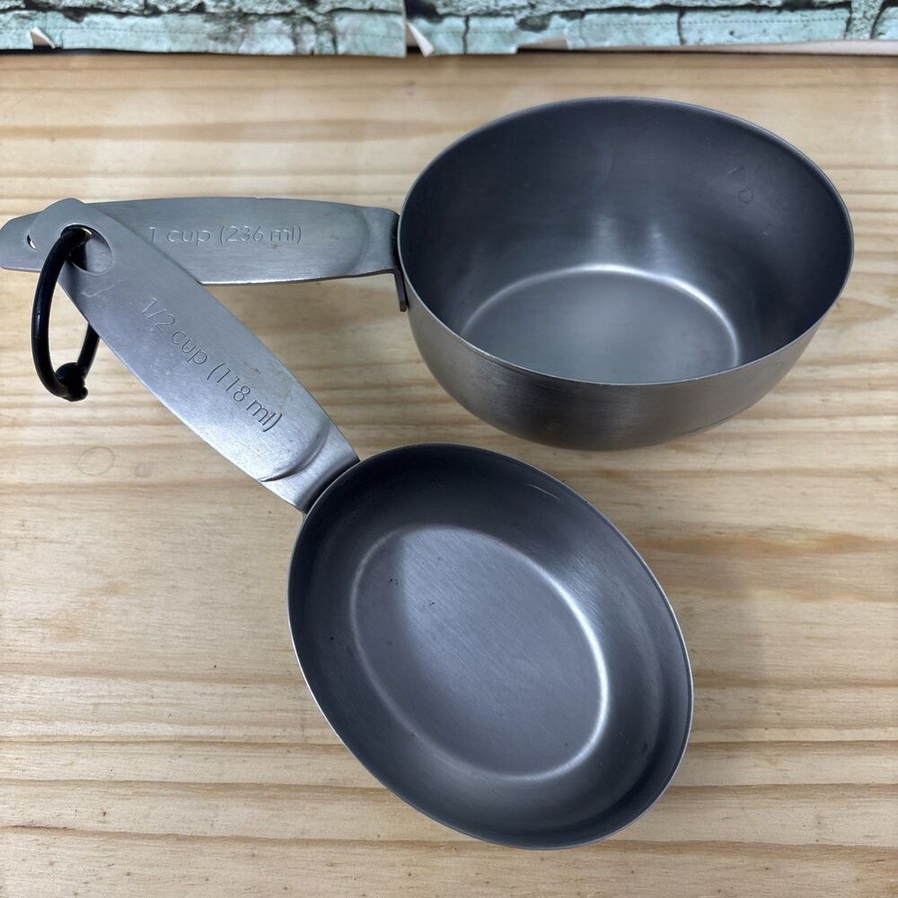 Oneida Stainless Steel 2 pc Measuring Cup Set w/ Handles, Markings 1, 1/2 OVAL